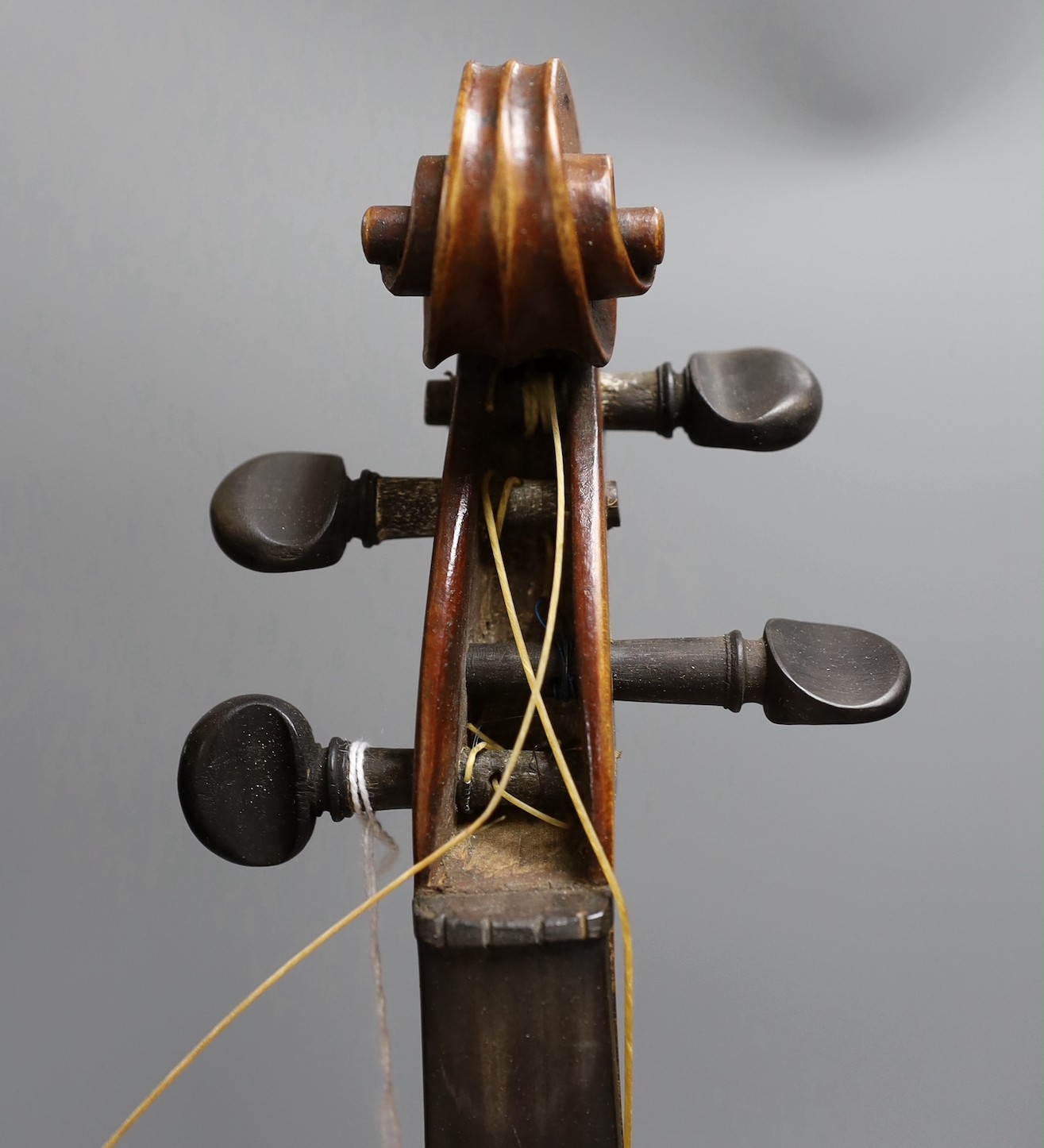 A cased 19th century violin, labelled Stradivarius 1690, with a Dodd bow
